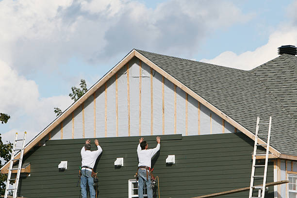 Professional Siding Installation technician working in Melbourne Beach, FL